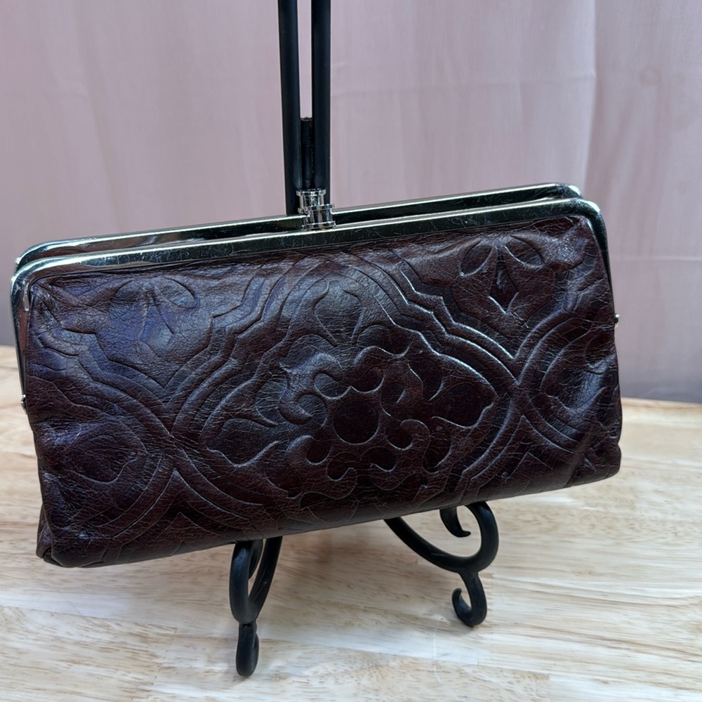 HOBO Brown Textured Leather Clutch with Vintage Embossed Charm